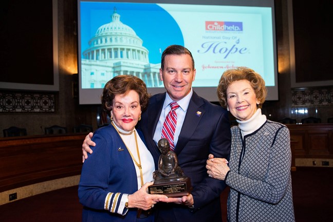 Pictured from left: Sara O'Meara, Childhelp co-founder and CEO; DCS Director Greg McKay; and Yvonne Fedderson, Childhelp co-founder and president.