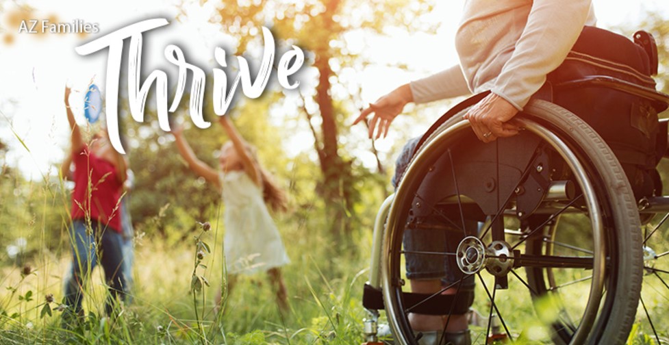 AZ Thrive Newsletter of a parent holding their child's hand with autumn leaves on the ground